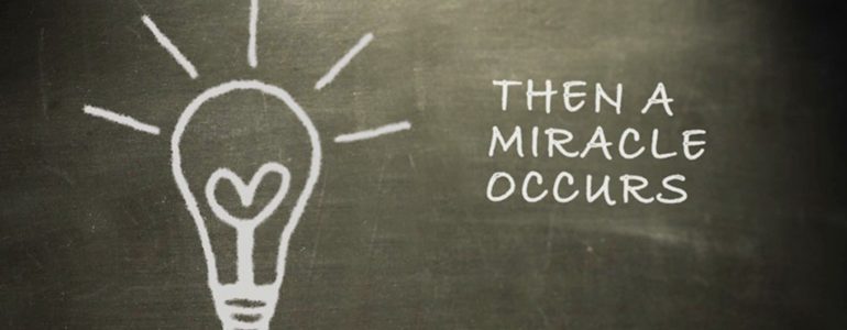 light bulb with text, "Then a Miracle Occurs"