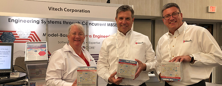 Ron Kratzke with colleagues at Vitech booth