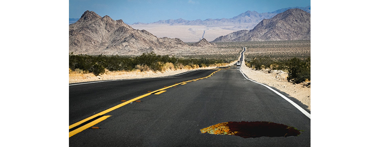 road with a pothole