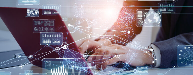 person working at laptop with superimposed images of engineering graphics